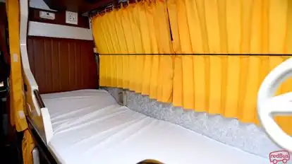 Auodumbar Tours and Travels Bus-Seats Image
