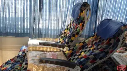 Orange Tours And Travels Bus-Seats Image