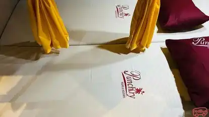 Punchiry Travels and Holidays Bus-Seats Image