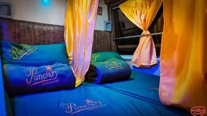 Punchiry Travels and Holidays Bus-Seats Image