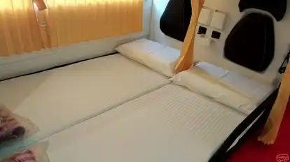 Orange Tours and Travels Bus-Seats Image